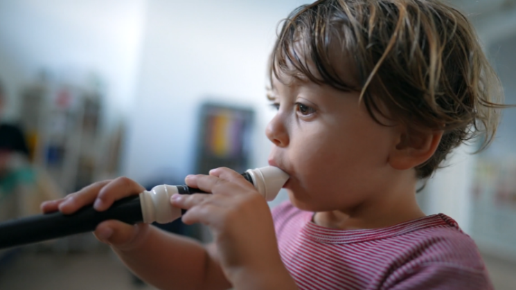 Toddler playing instruments
